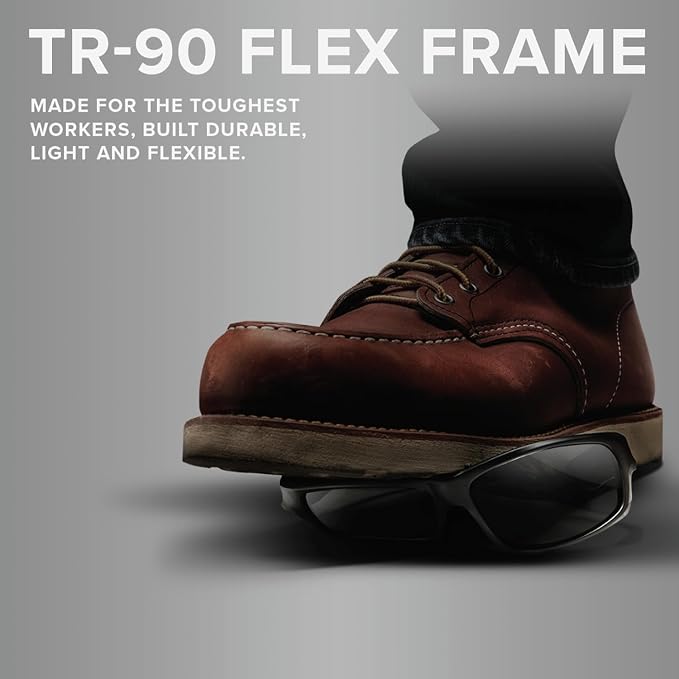 Worker wearing boots stepping on a pair of Lift Safety Banshee Safety Glasses