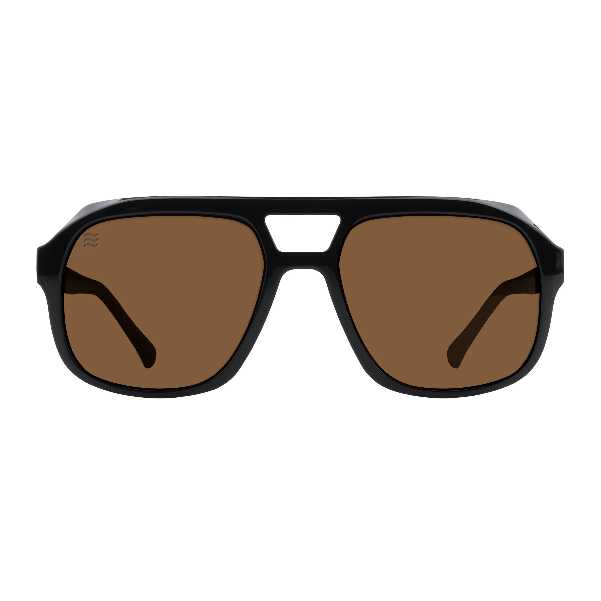 Neven Gaia polarized sunglasses with a black aviator-style frame and brown lenses on a white background.