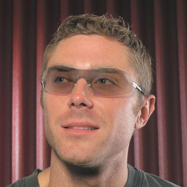 MCR Safety S22 Small Safety Glasses with Indoor/Outdoor Lens worn by a man